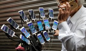 Taiwan's 'Pokemon Grandpa' Attached 15 Phones To His Bike Handlebars